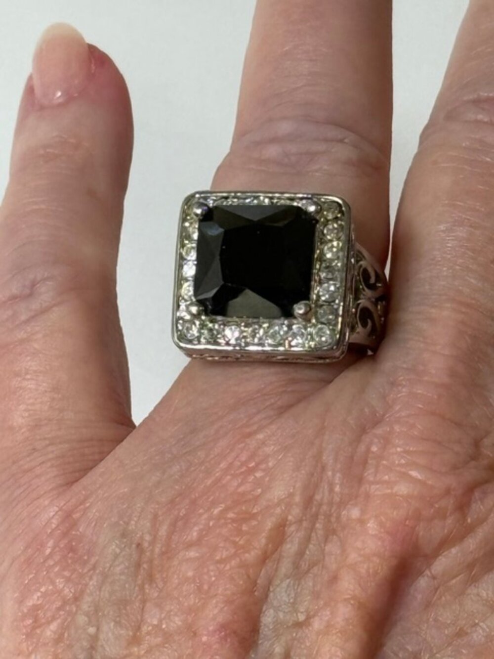 Black stone, silver-tone fashion statement ring.